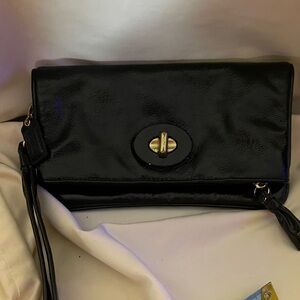 Coach Elegant Black Clutch Bag with removable wristlet strap. J0873-42437